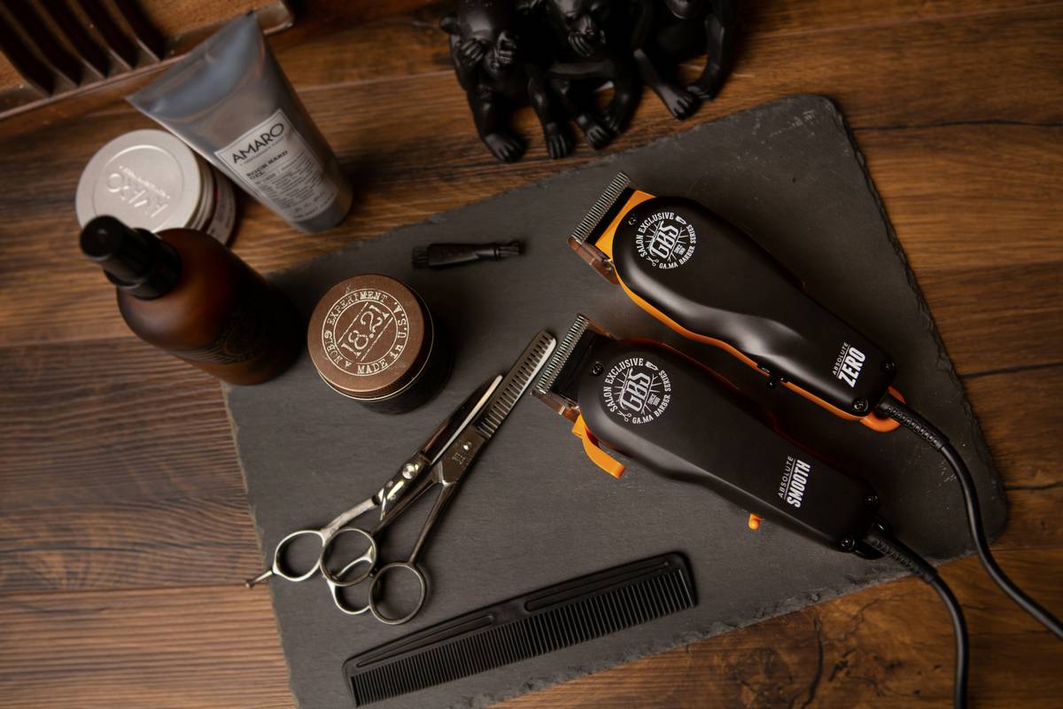 grooming supplies beard grooming kits featuring shaving soap, badger brush, and razor on a wooden tray